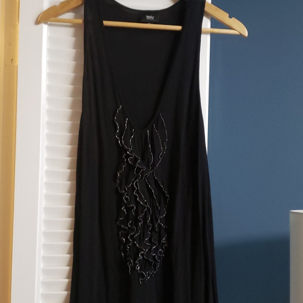 Tank with sparkly ruffles.